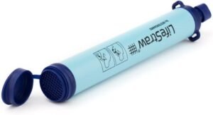 LifeStraw Personal Water Filter for Emergency Preparedness depicted in packaging, featuring a compact blue device with a protective cap, designed to filter water from contaminated sources, ensuring safe drinking water during outdoor activities and emergencies.